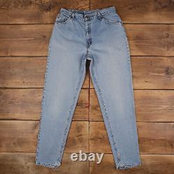 Vintage Levis 950 Jeans 31 x 33 USA Made 90s Raw Hem Stonewash Tapered Blue